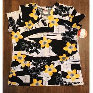 Yellow and black floral scrub top